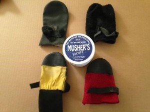 Variety of booties I've tried and Musher's Secret (dog paw wax).